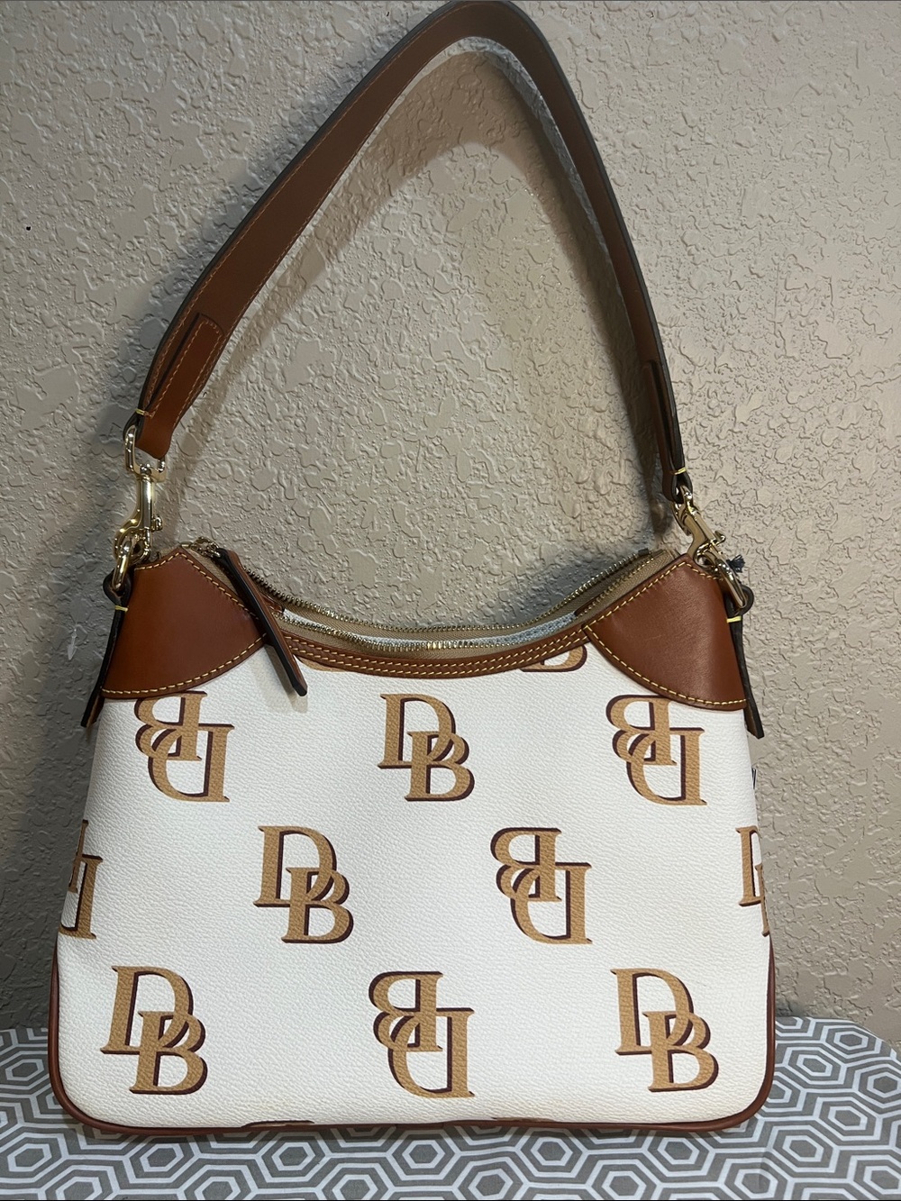 Dooney & Bourke hobo. BMONO1957 BEKR. Beige colored